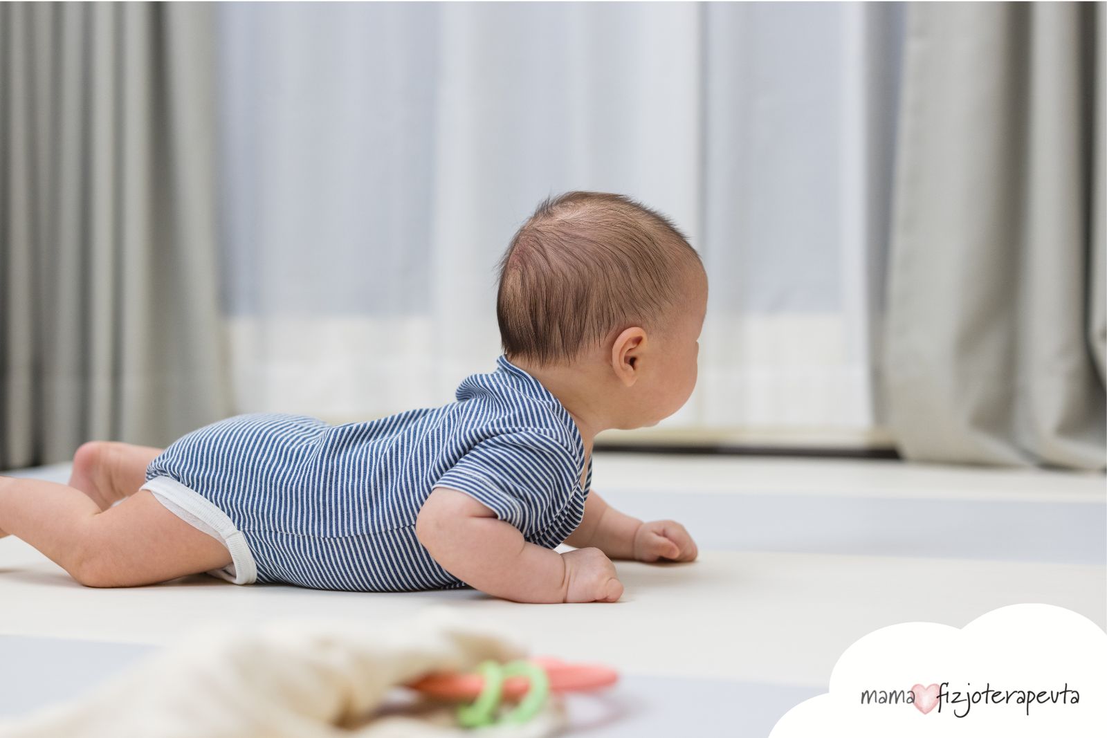 niemowlaka.webp
Niemowlę podczas aktywności w leżeniu na brzuszku