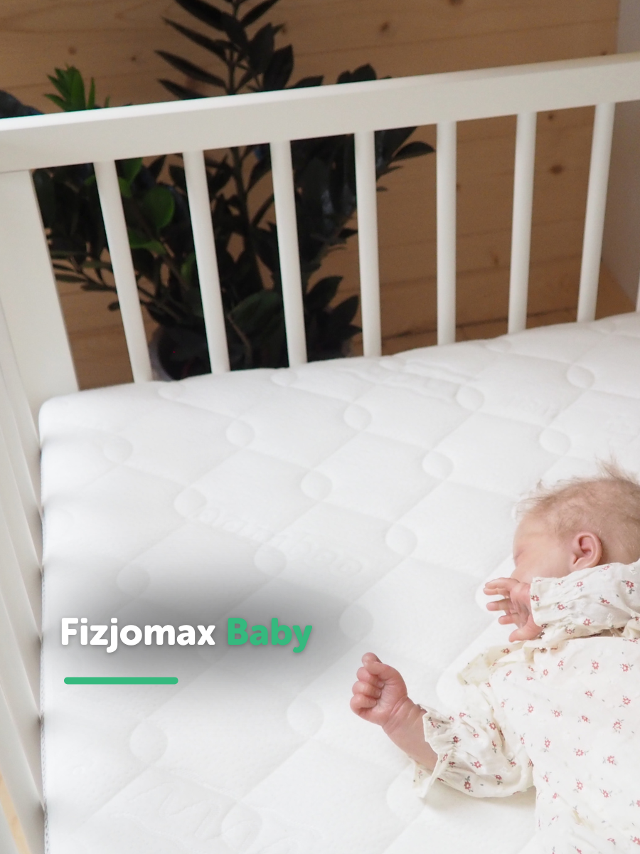 Materac Fizjomax Baby w łóżeczku niemowlęcym